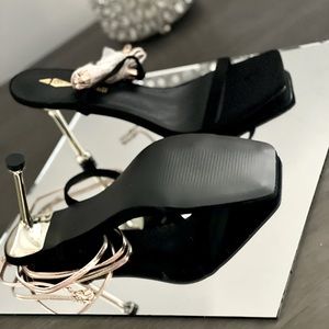 Size 8 black wrap around ankle heels